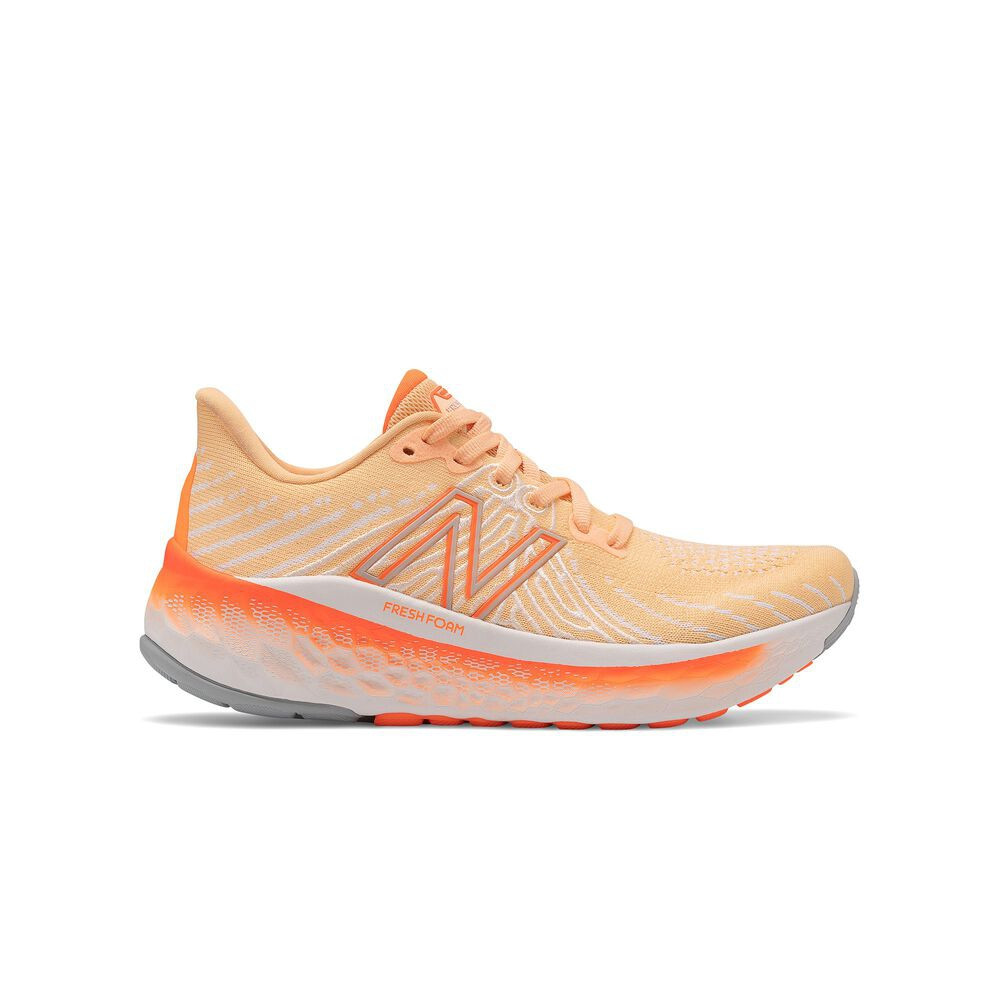 orange new balance tennis shoes