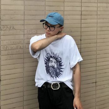 Jesus in white T-shirt