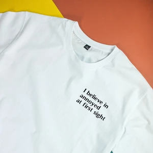 Áo thun cotton 100% in chữ I believe in annoyed at first sight