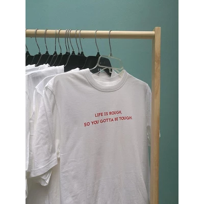 Áo thun cotton 100% in chữ "Life is rough, so you gotta be tough
