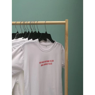Áo thun cotton 100% in chữYou have no thing to lose and a world to see
