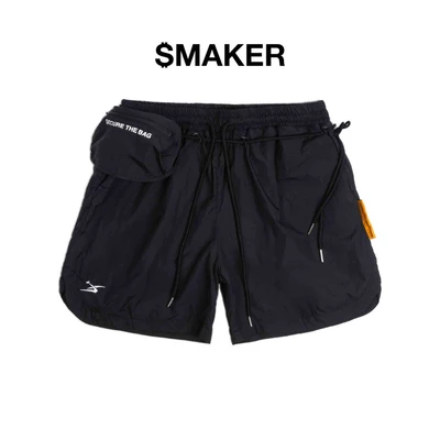 [SMAKER] Quần đùi form ngắn vải nylon màu đen có túi nhỏ đi kèm - SHORT NYLON EXTRA POCKET IN BLACK