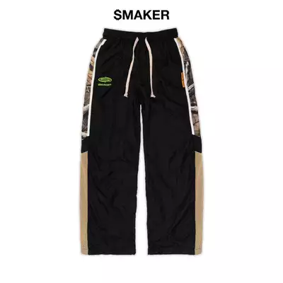 [SMAKER] Quần dài màu đen 100% vải nylon nhăn điểm nhấn hoạ tiết lính camo - LEAF CAMO TRACK PANTS IN BLACK