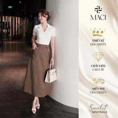 Chân Váy Midi Dáng A Đỉa Trang Trí Khuy Sừng Chất Kaki Hàn Màu Nâu Rêu MACI MCVCVNA0336