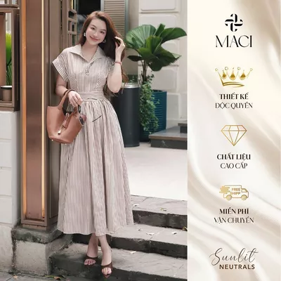 Đầm Sơ Mi Dáng Xoè Cổ Bẻ Tay Lơ Vê Kẻ Nâu Chất Thô Cotton Kèm Khuy Trang Trí MACI MCVVAKE0374
