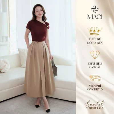 Chân Váy Kaki Xếp Li Xoè Cạp Quai Nhê Khuy Sừng MACI MCVCVBE0395 Thời Trang Nữ Thiết Kế Độc Quyền