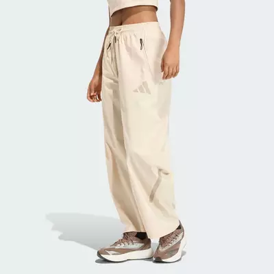 adidas Phong cách sống QUẦN DỆT ADIDAS Z.N.E. Nữ Be KD8479