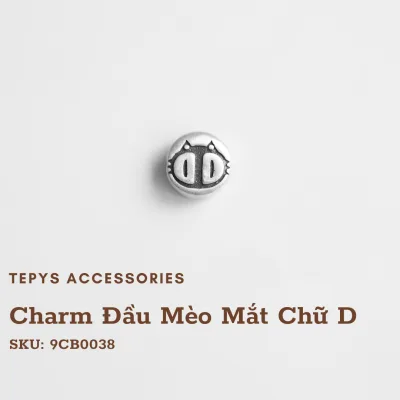 Charm Đầu Mèo Mắt Chữ D
