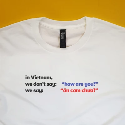 Áo Thun Cotton 100% Unisex với slogan “In Vietnam we say Ăn cơm chưa”