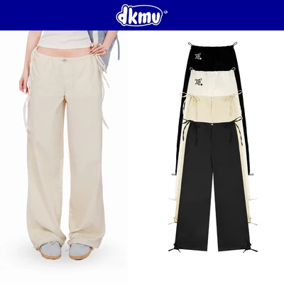 Quần suông ống rộng nữ dây rút 2 bên DKMV kaki thêu chữ và logo con cá màu kem, đen thắt nơ Ribbon Parachute Pants