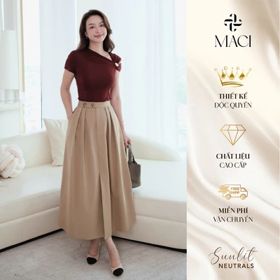 Chân Váy Kaki Xếp Li Xoè Cạp Quai Nhê Khuy Sừng MACI MCVCVBE0395 Thời Trang Nữ Thiết Kế Độc Quyền