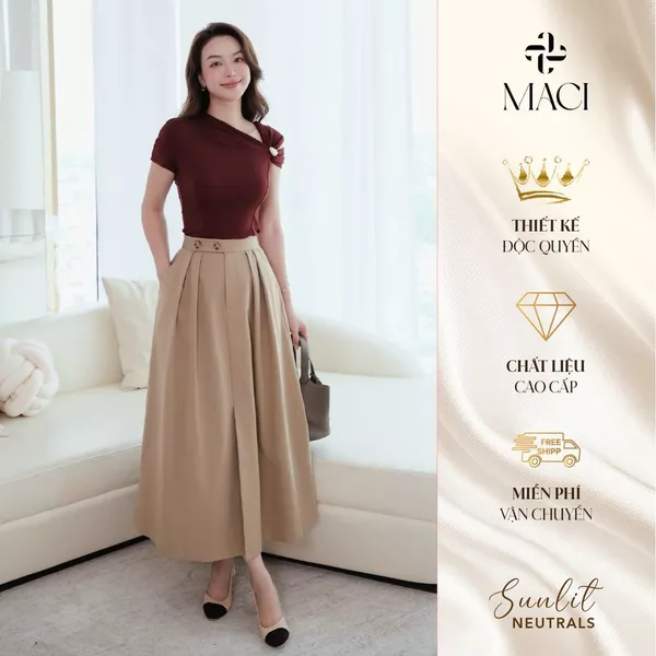 Chân Váy Kaki Xếp Li Xoè Cạp Quai Nhê Khuy Sừng MACI MCVCVBE0395 Thời Trang Nữ Thiết Kế Độc Quyền