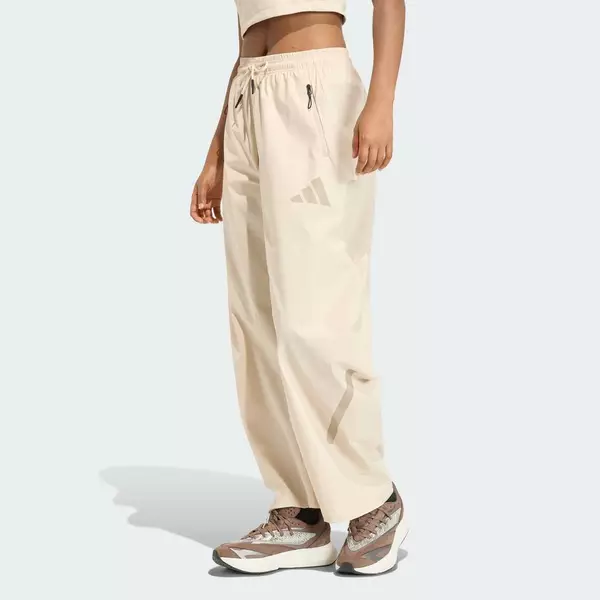 adidas Phong cách sống QUẦN DỆT ADIDAS Z.N.E. Nữ Be KD8479