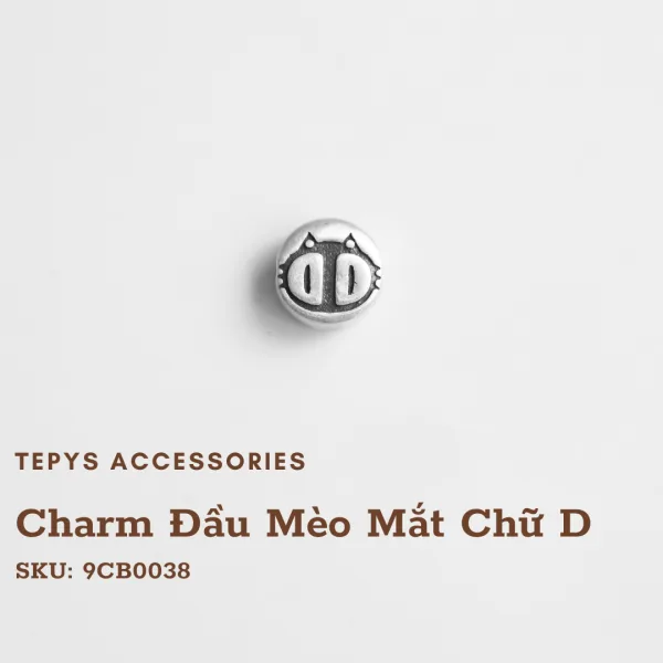 Charm Đầu Mèo Mắt Chữ D