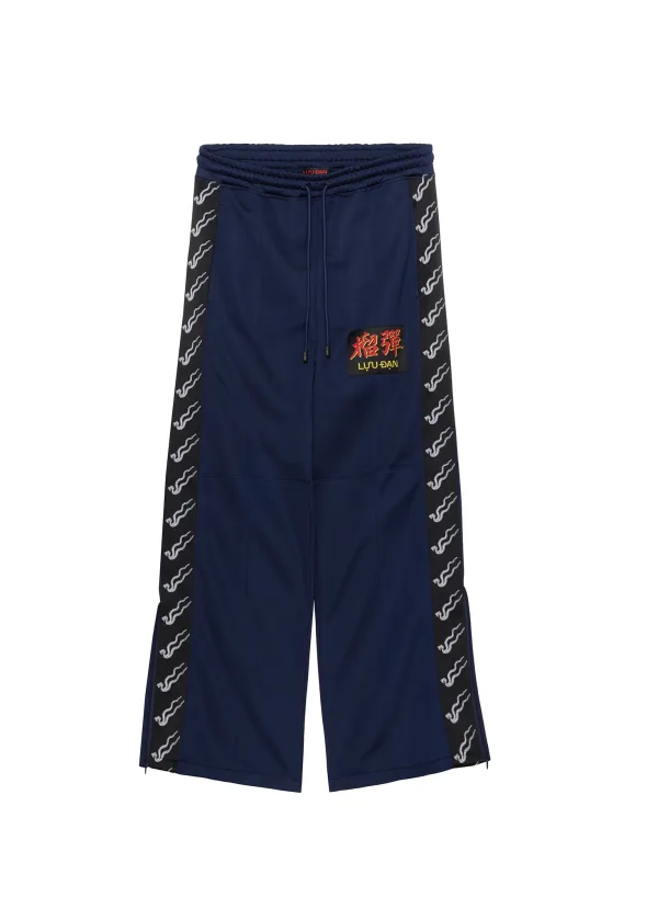 STACKED TRACK PANTS