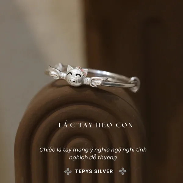 LẮC TAY HEO CON