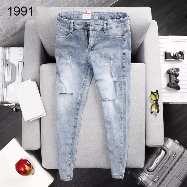 Quần jean nam co dãn xanh nhạt rách hai gối