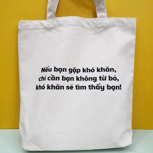 Túi tote vải canvas in chữ Khó khăn sẽ tìm thấy bạn