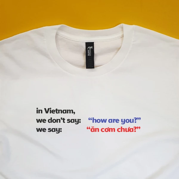 Áo Thun Cotton 100% Unisex với slogan “In Vietnam we say Ăn cơm chưa”
