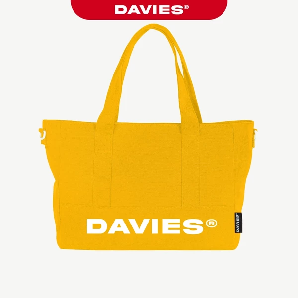 Túi đeo chéo nam to rộng 2 mặt DAVIES  in chữ phối logo inox chất canvas có lót dù màu vàng  Medium Tote Bag| D-B69-V