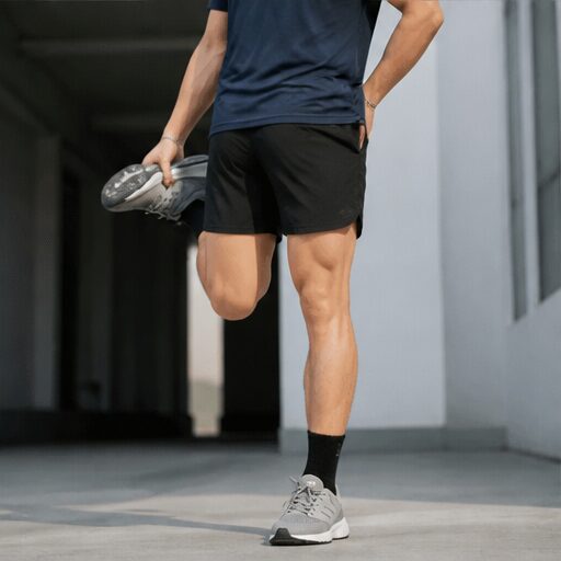 Áo thun polyester xanh navy, quần short polyester đen. — ảnh 3/4